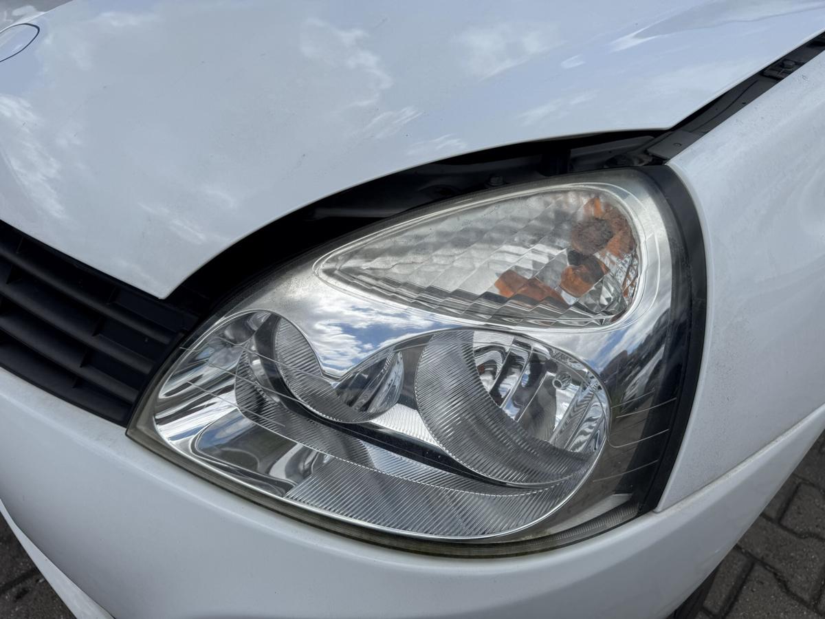 Renault Clio 2 original Scheinwerfer vorn links Halogen Chrom Hintergrund Facelift Bj.2009